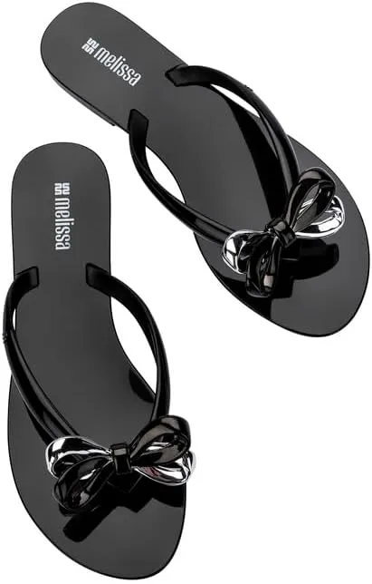 Melissa Harmonic Eclipse Womens Fashion Sandals - Dressy Flip Flops with Metallic Bow - Lightweight PVC, Flexible Design - Summer Sandals for Women, Flat & Flexible